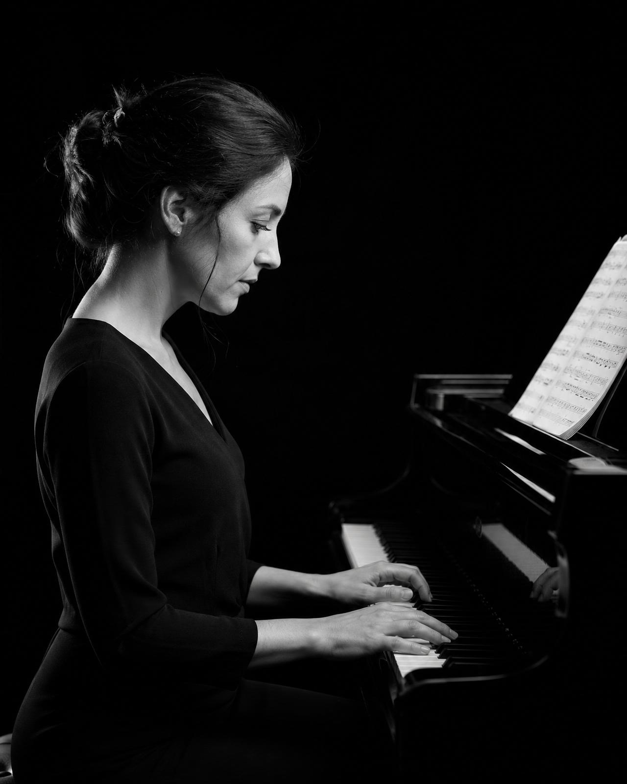 Adult beginner taking an in-home piano lesson in Costa Mesa, Orange County